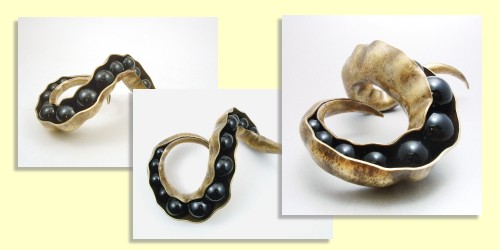 "Pod" Sculpture, hammered brass with glass "seeds" by Steve Shelby