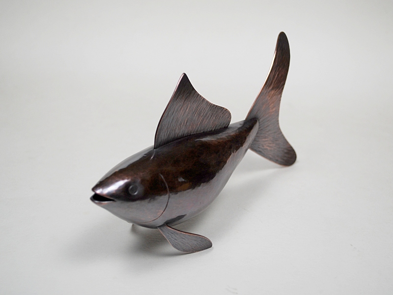 Steve Shelby makes a copper fish